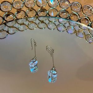 Long Svarovski earrings.